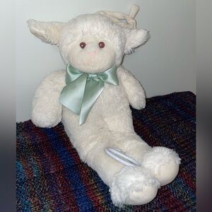Plush Lamb Baby Toy with Green Bow